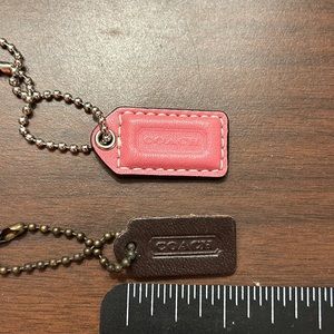 New and vintage Leather Coach tags with silver and metal beaded chain bag charm
